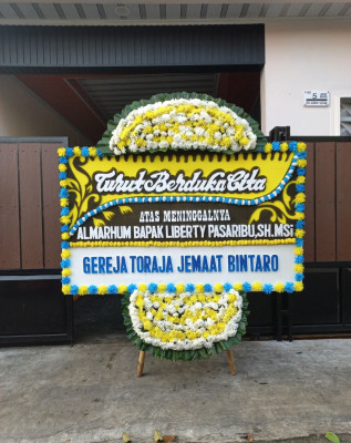 Papan Bunga Duka di Bajuin